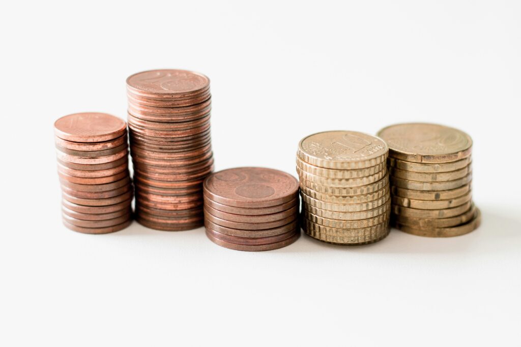 Fiance tips - Image of coins stacked in four rows 